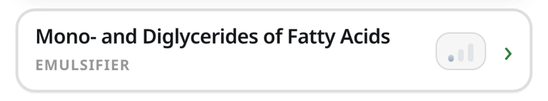A single row from Food Metric's Additives list: "Mono- and Diglycerides of Fatty Acids," labeled "EMULSIFIER," with a small concern-meter icon and an arrow to open details.