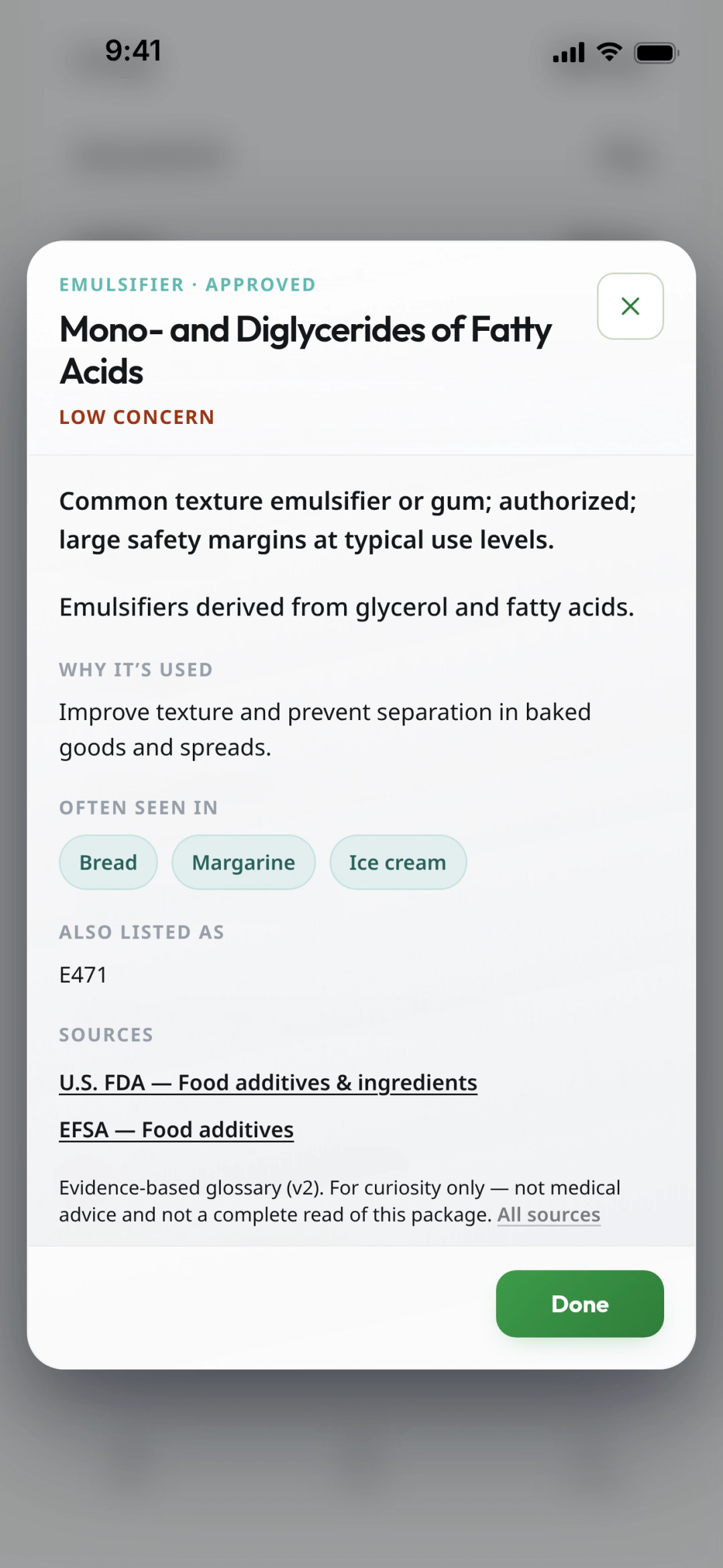 Food Metric's additive detail sheet for Mono- and Diglycerides of Fatty Acids. It shows "EMULSIFIER · APPROVED," a "LOW CONCERN" label, the lead "Emulsifiers derived from glycerol and fatty acids," a "Why it's used" note about texture and keeping baked goods and spreads from separating, "Often seen in" chips for Bread, Margarine, and Ice cream, "Also listed as: E471," source links to the U.S. FDA and EFSA, and a footer saying it's for curiosity only and not medical advice.